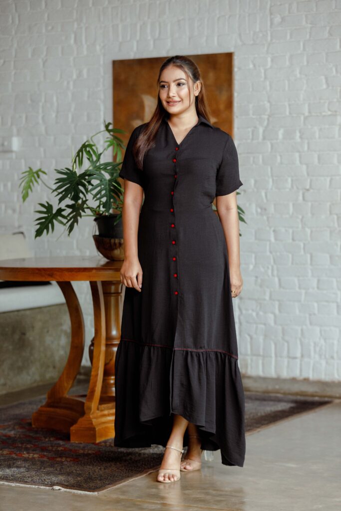 : Black colour high low shirt dress with contrast buttons OK92275
